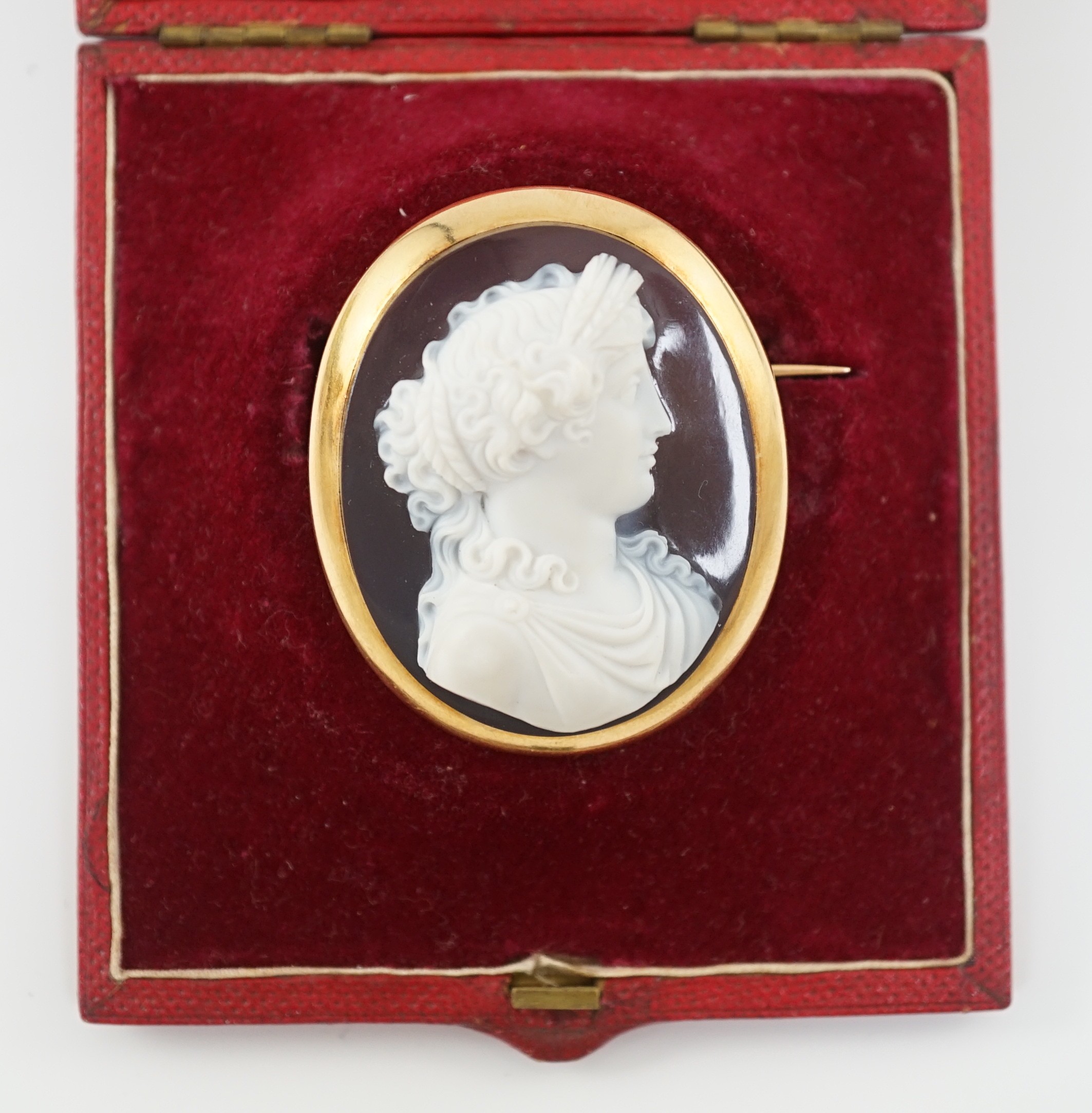 A late 19th/early 20th century gold mounted chalcedony cameo set oval brooch